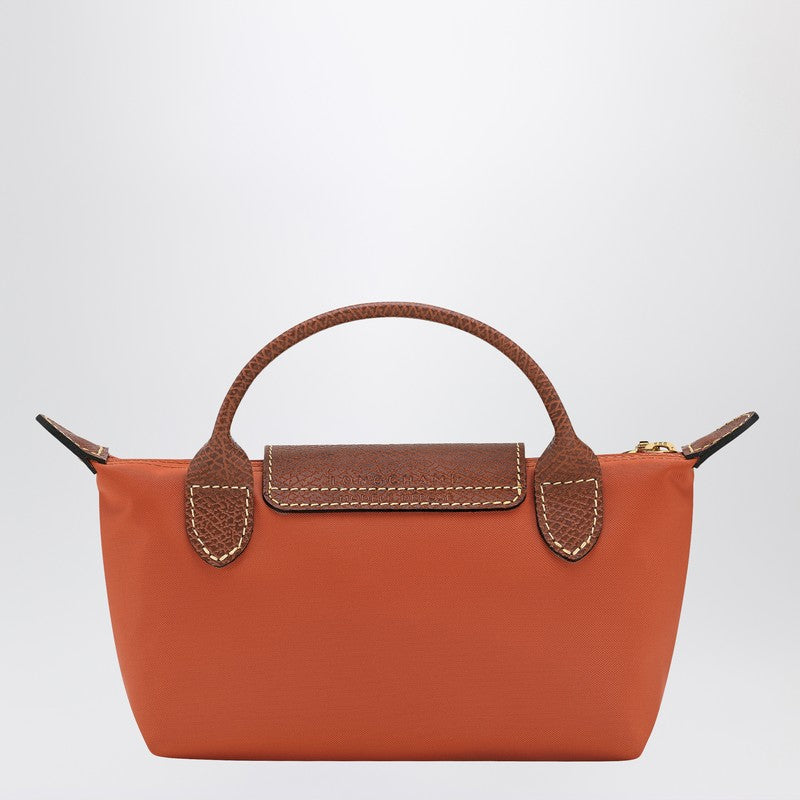 Longchamp Le Pliage Original brick-coloured clutch bag