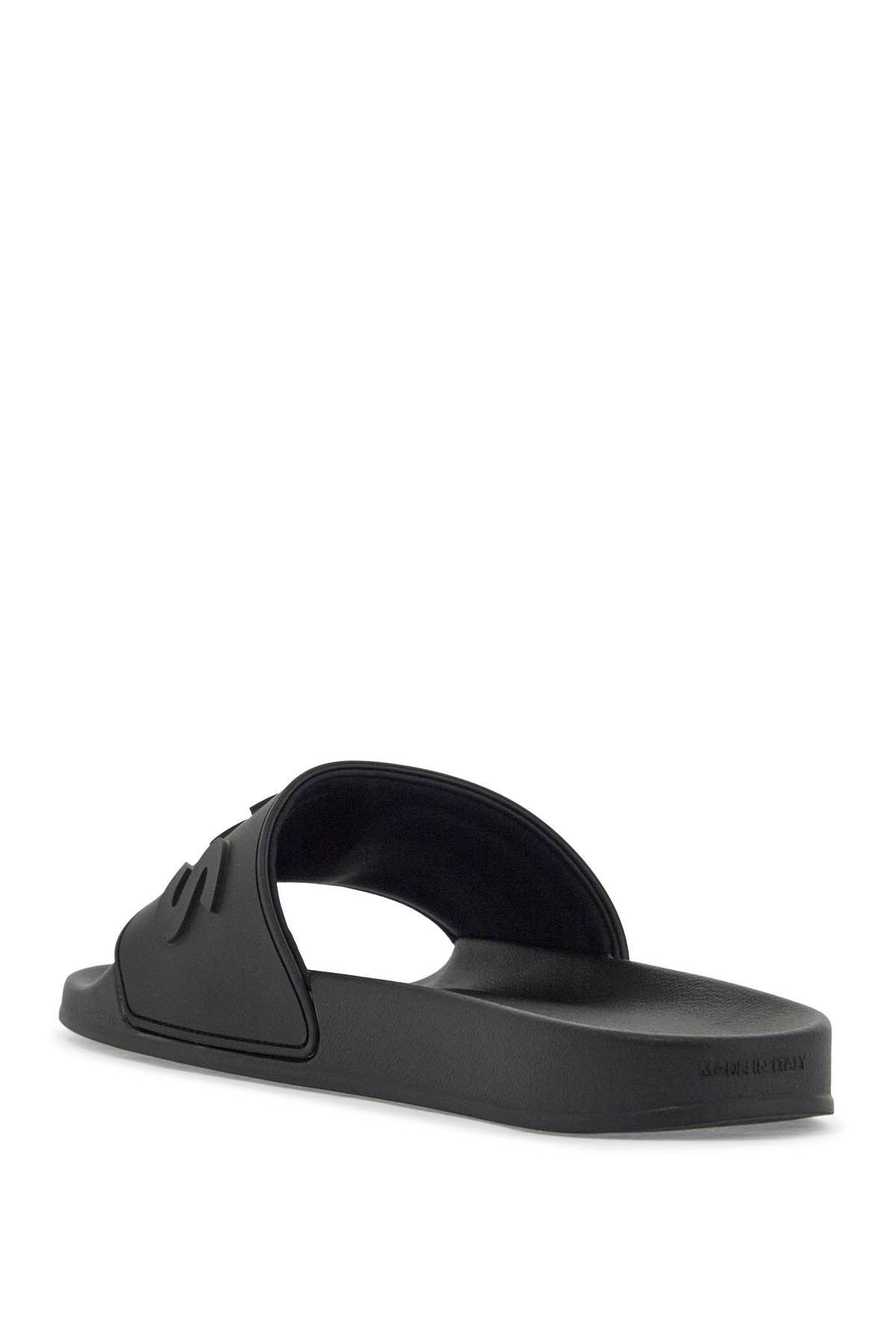 black minimalist men's slippers with embossed logo