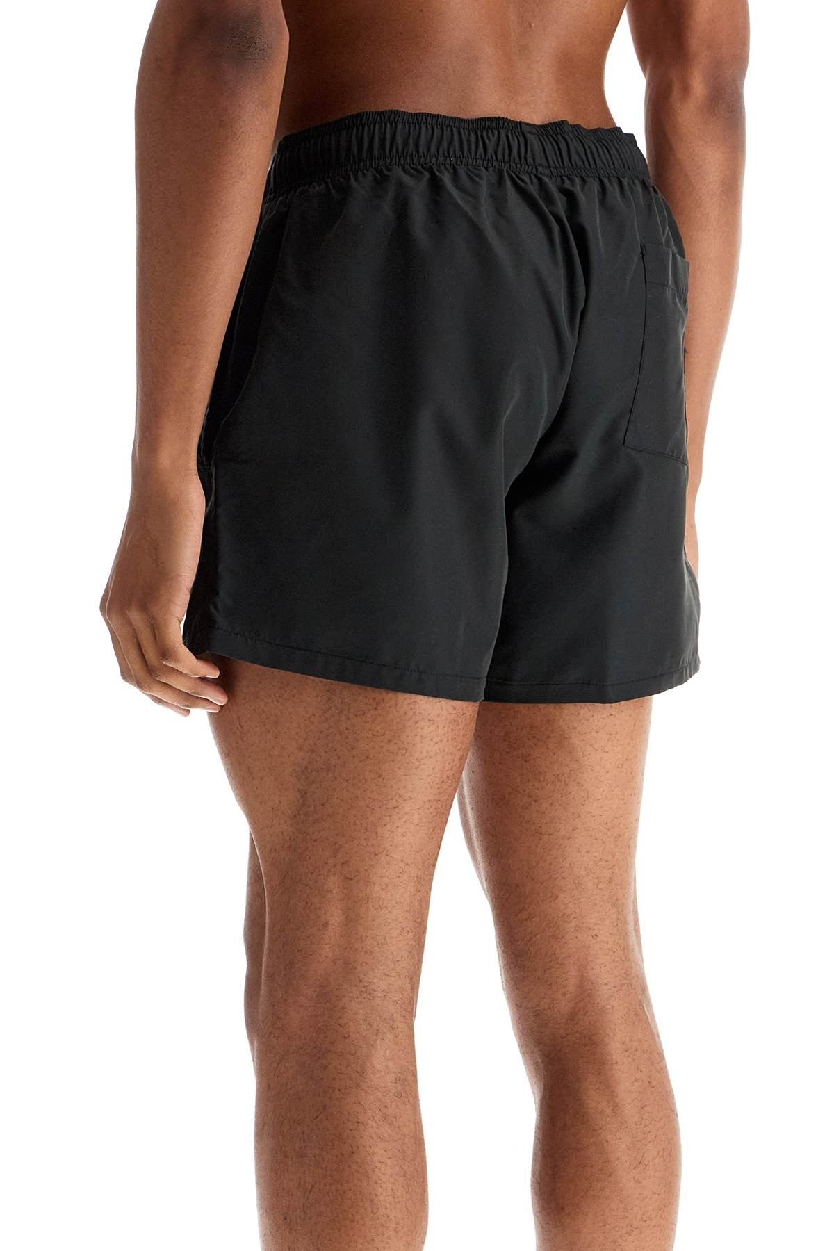black swimsuit made of recycled polyester with quick-dry feature