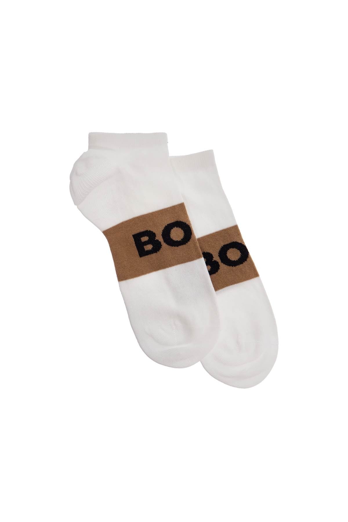 low-cut gray and white socks with gold logo and brown band
