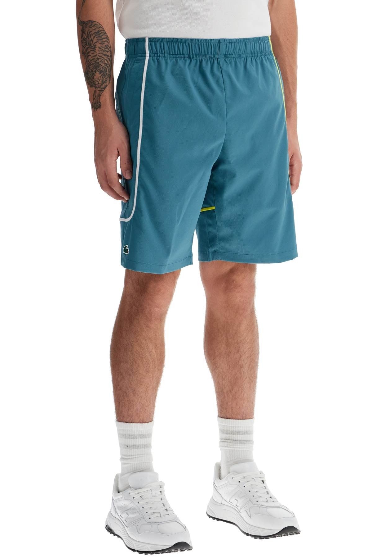 sporty bermuda shorts with contrasting stitching