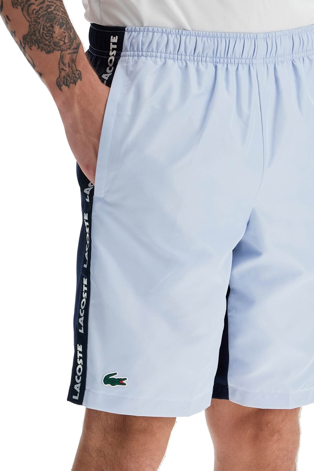 with logo on the bermuda shorts