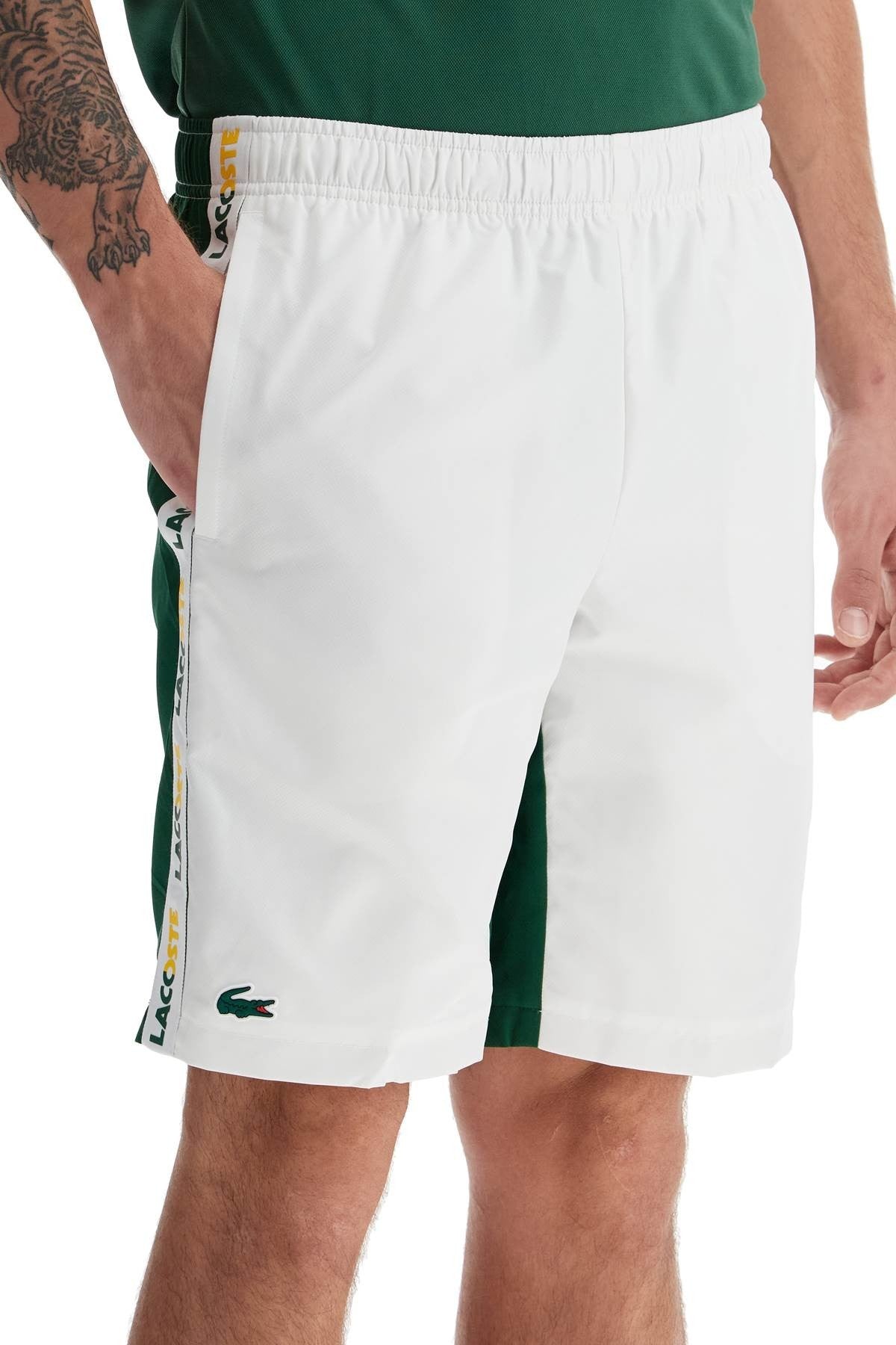 with logo on the bermuda shorts