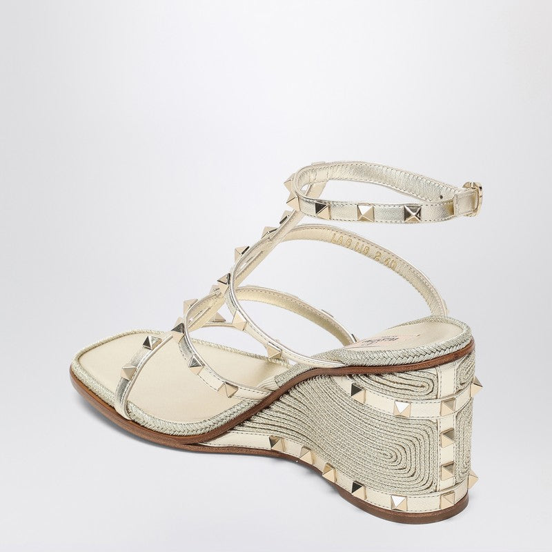 Valentino Garavani Rockstud wedge sandals in platinum color
