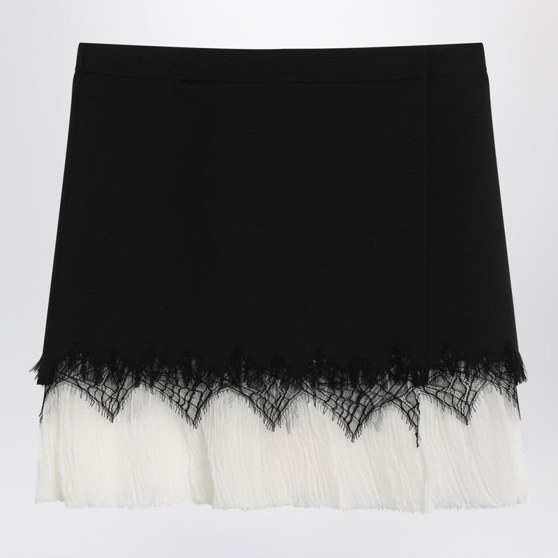 Alexander McQueen Mini skirt with black/ivory spider lace