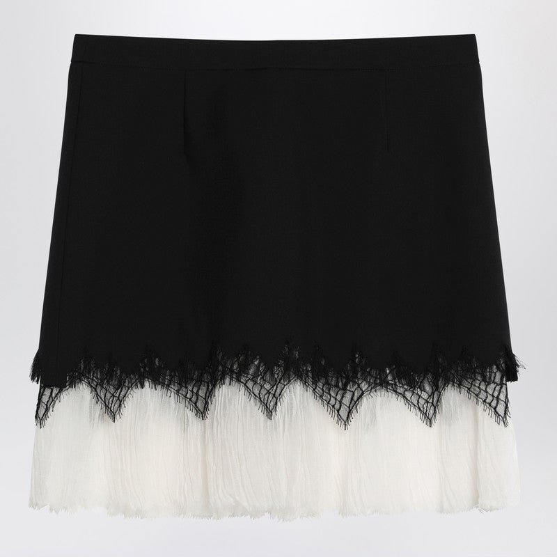 Alexander McQueen Mini skirt with black/ivory spider lace
