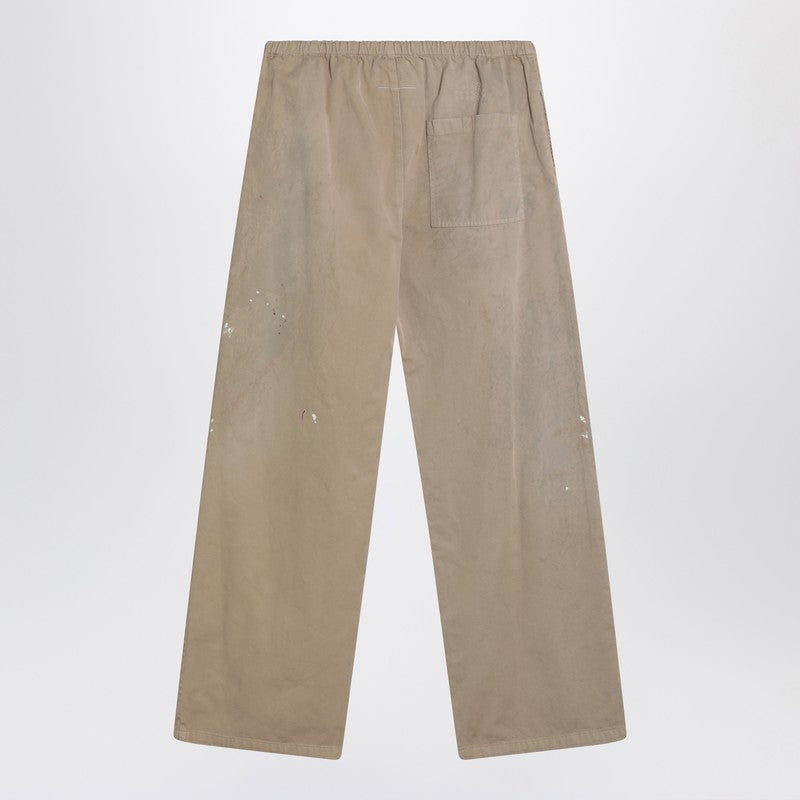 MM6 Maison Margiela Wide beige trousers with brushstrokes