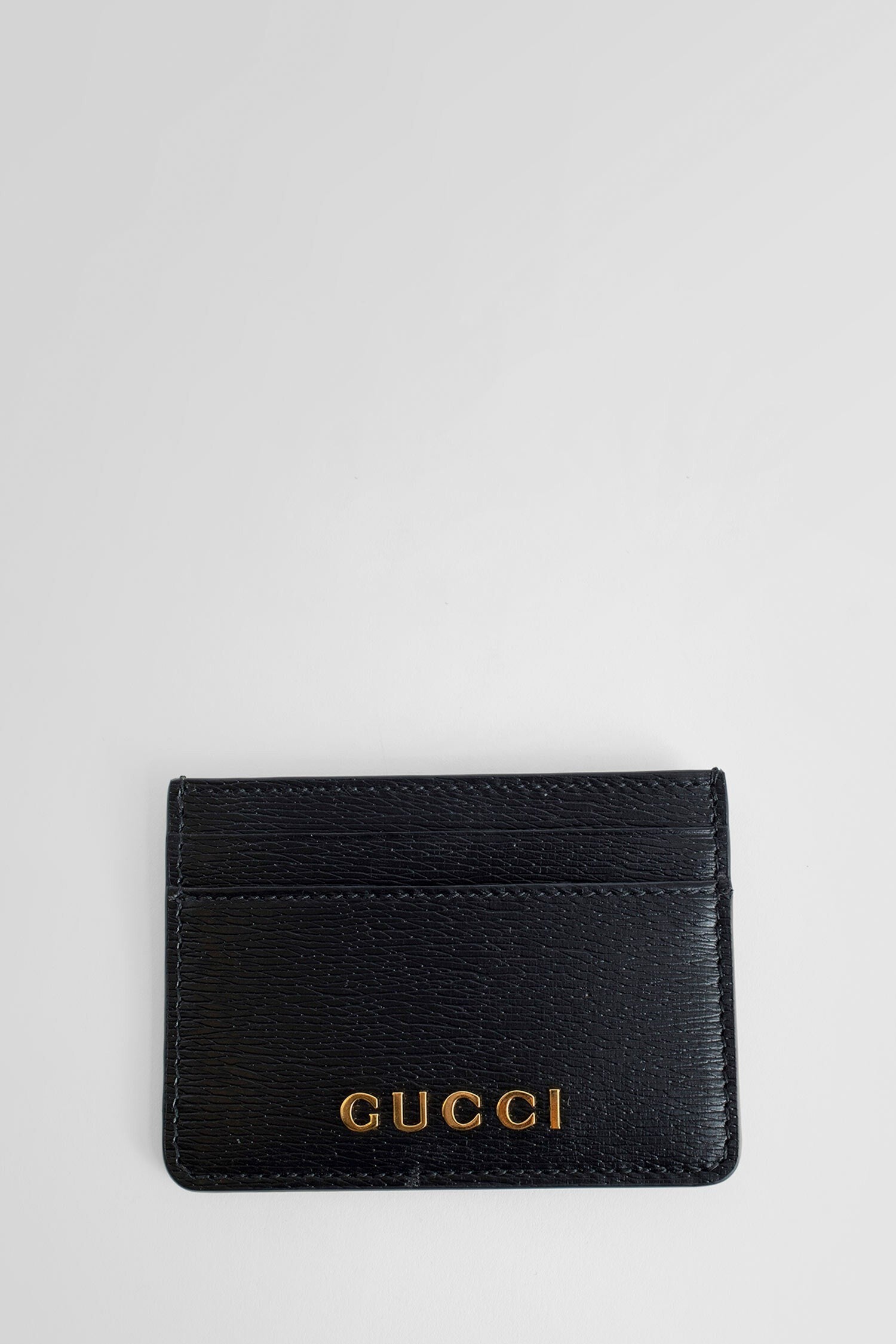 card case with gucci script