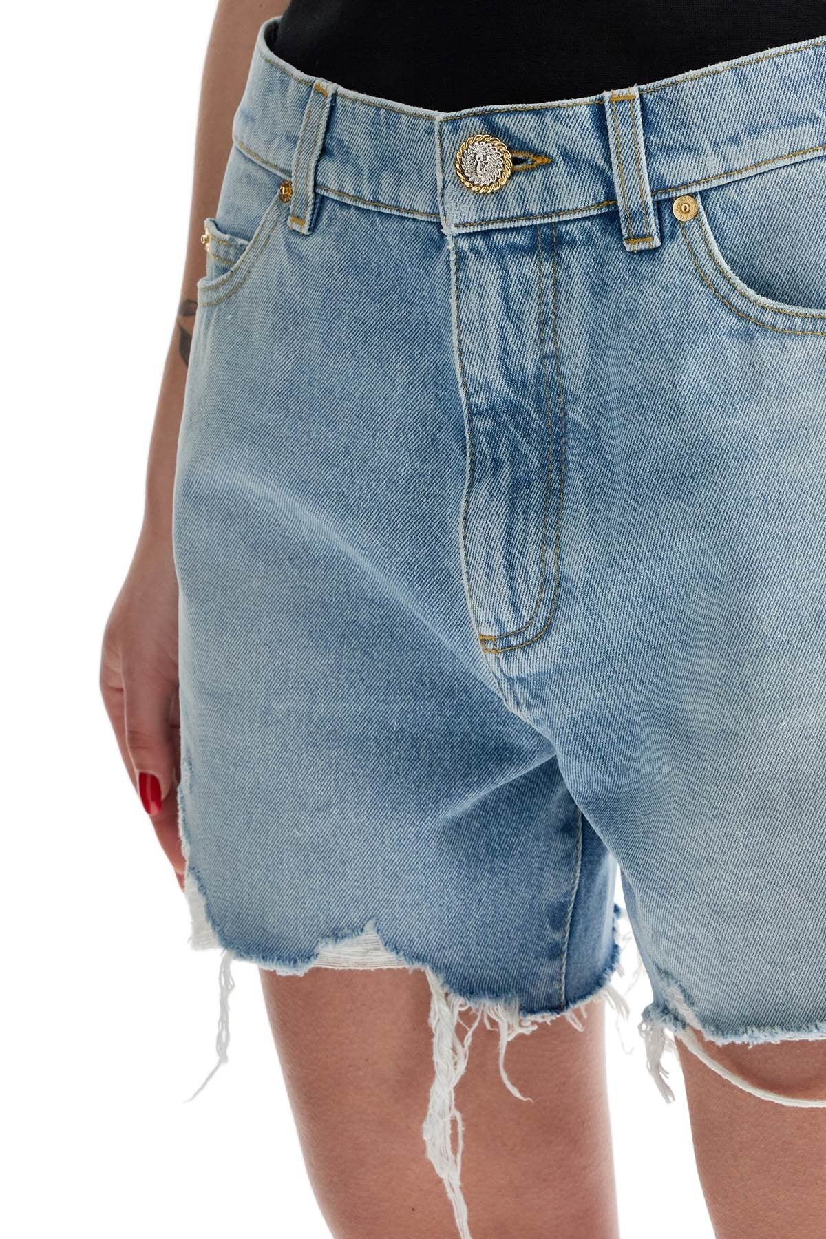 destroyed denim shorts for a casual