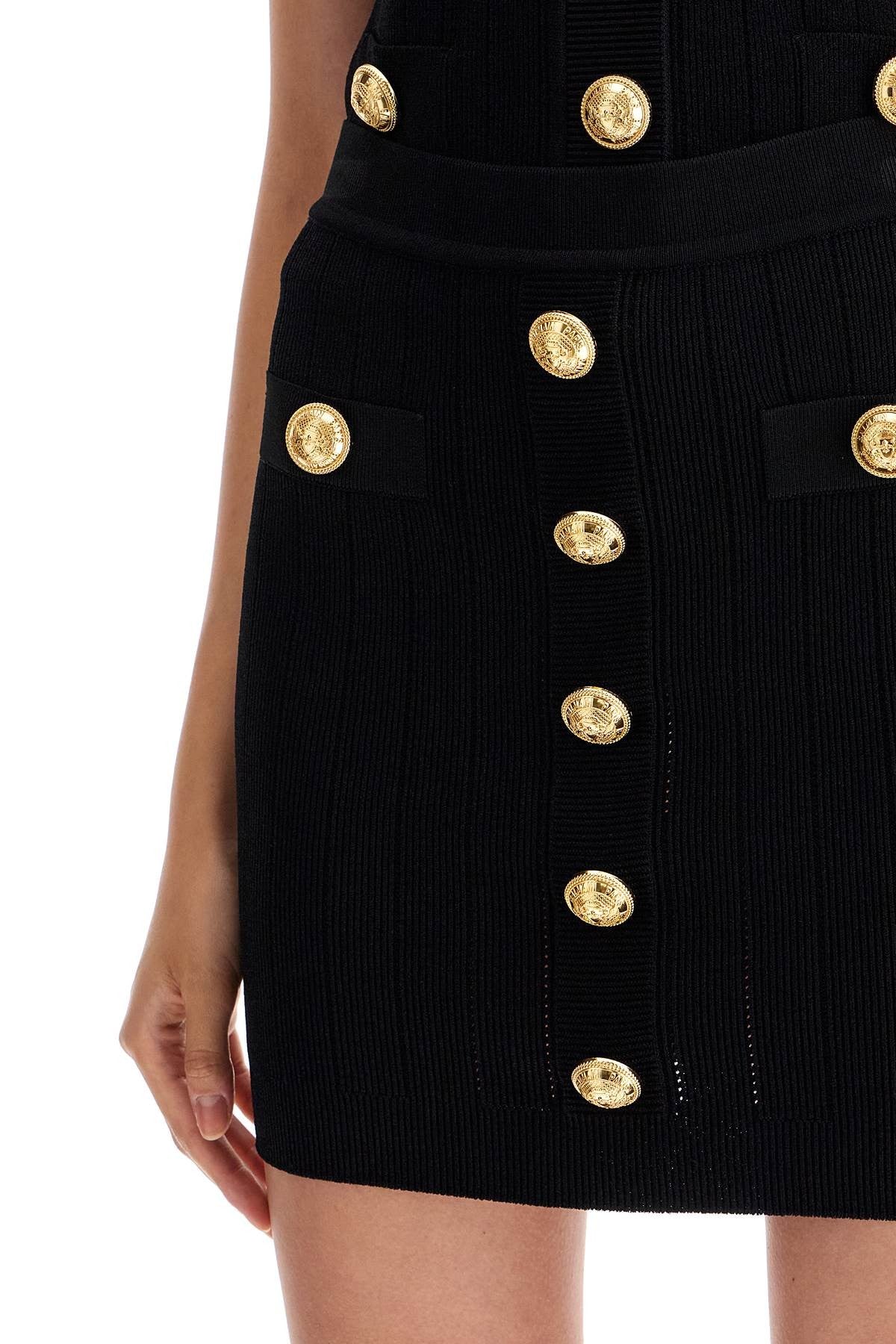 knitted mini skirt with embossed buttons