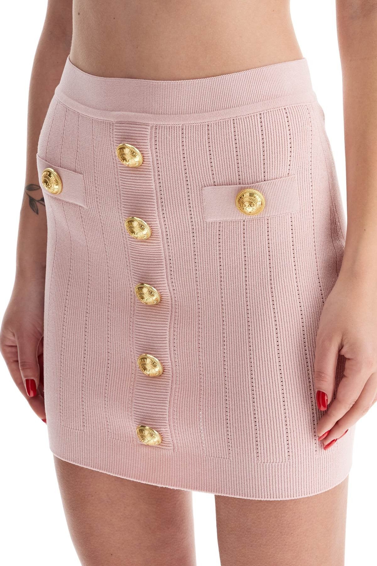 knitted mini skirt with embossed buttons