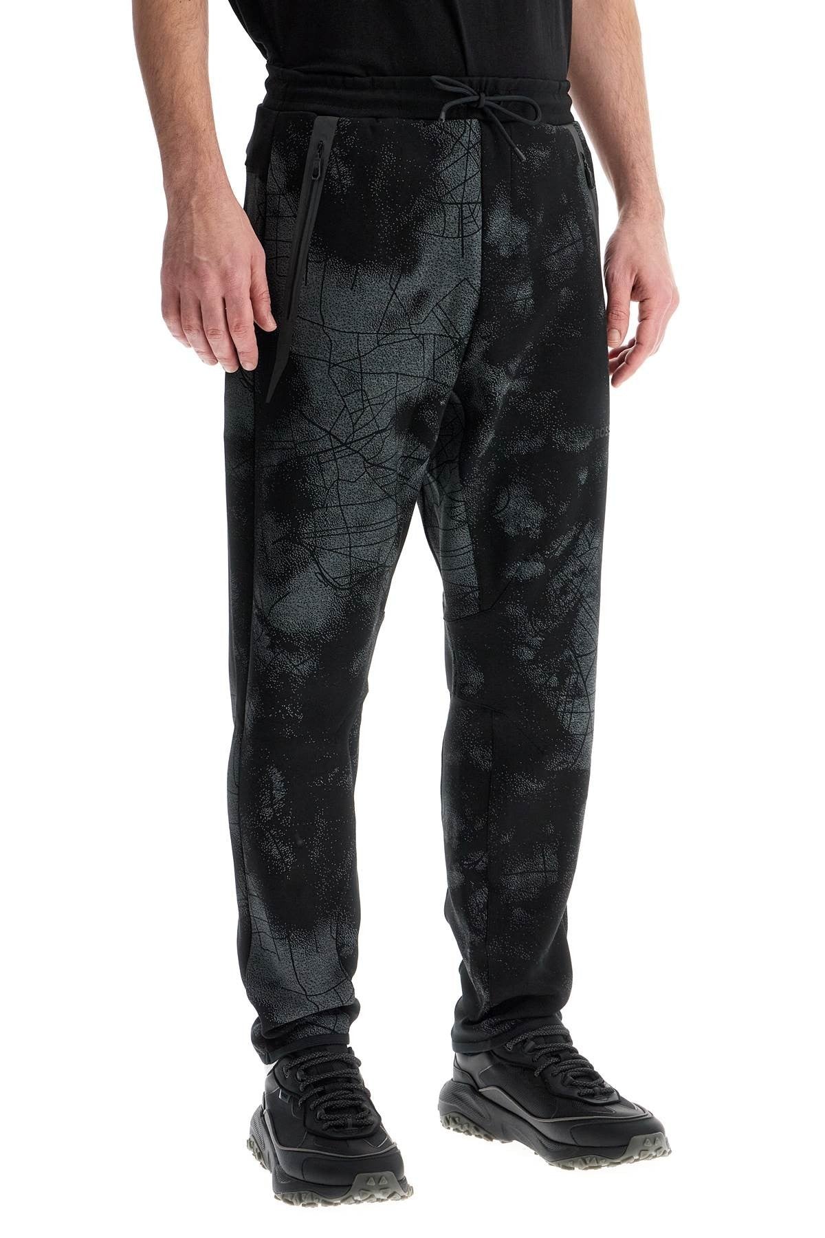 men's high-waisted black regular fit pants with zip pockets and drawstring