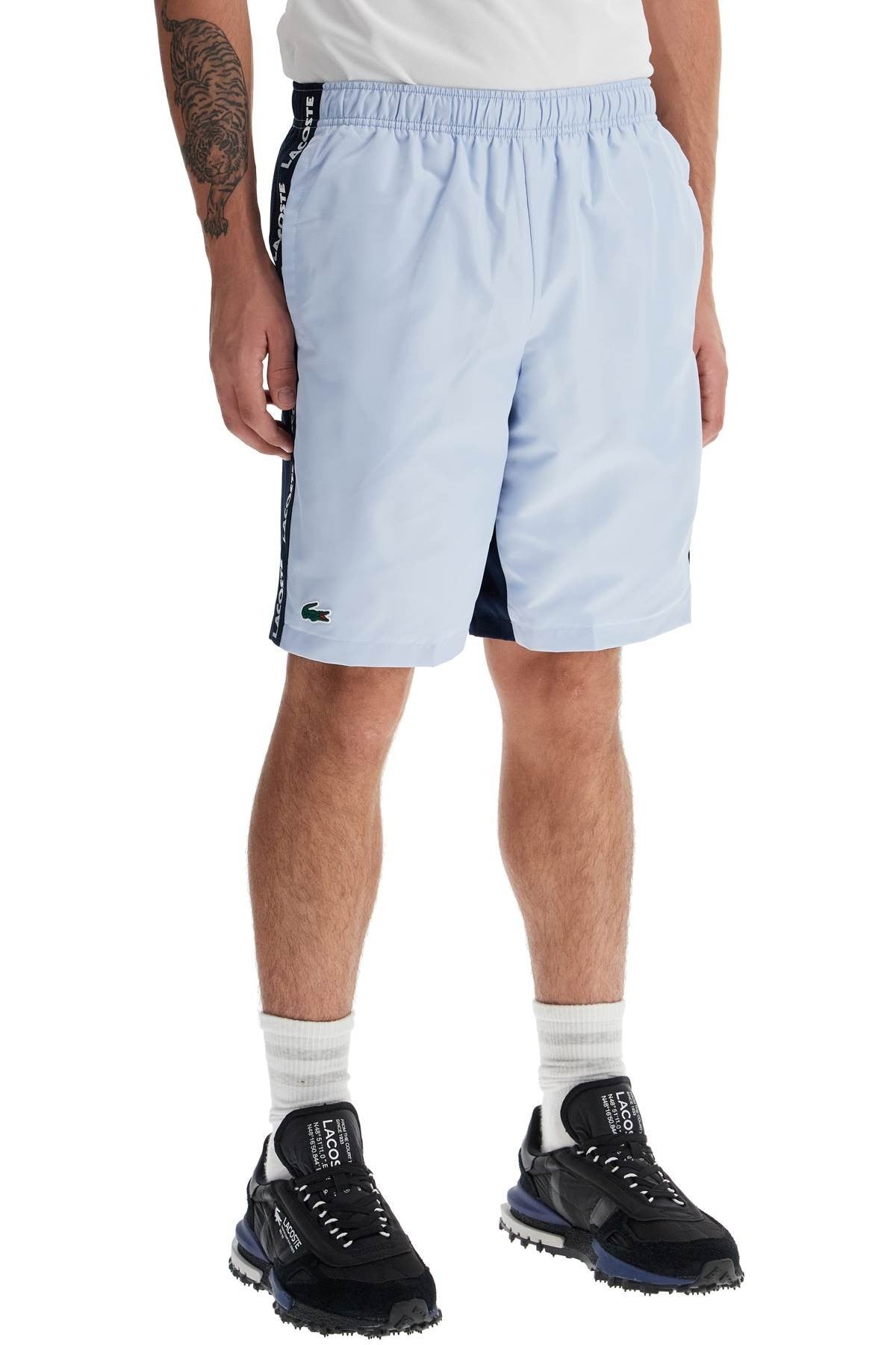with logo on the bermuda shorts