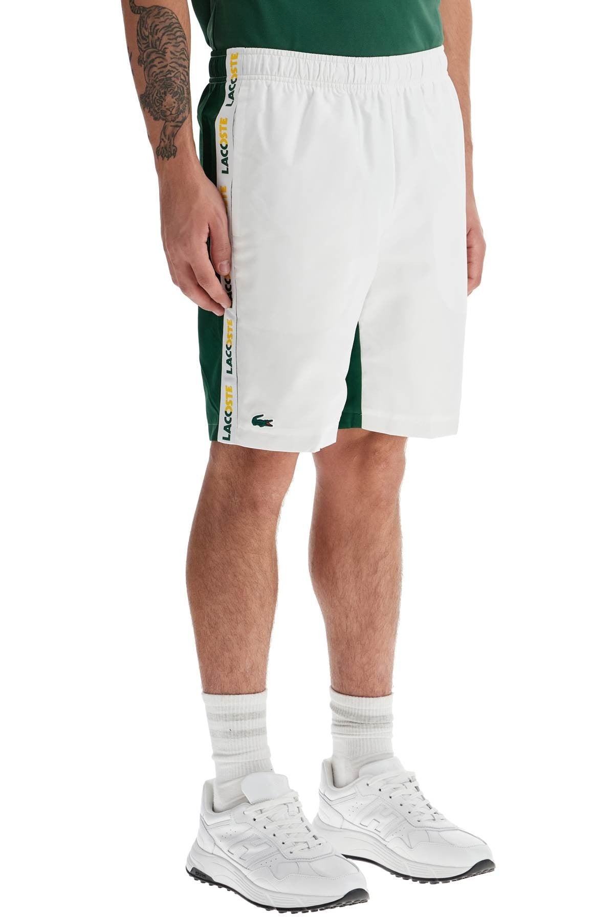 with logo on the bermuda shorts